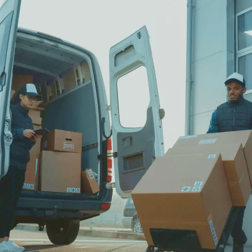 Man moving cargo into a truck